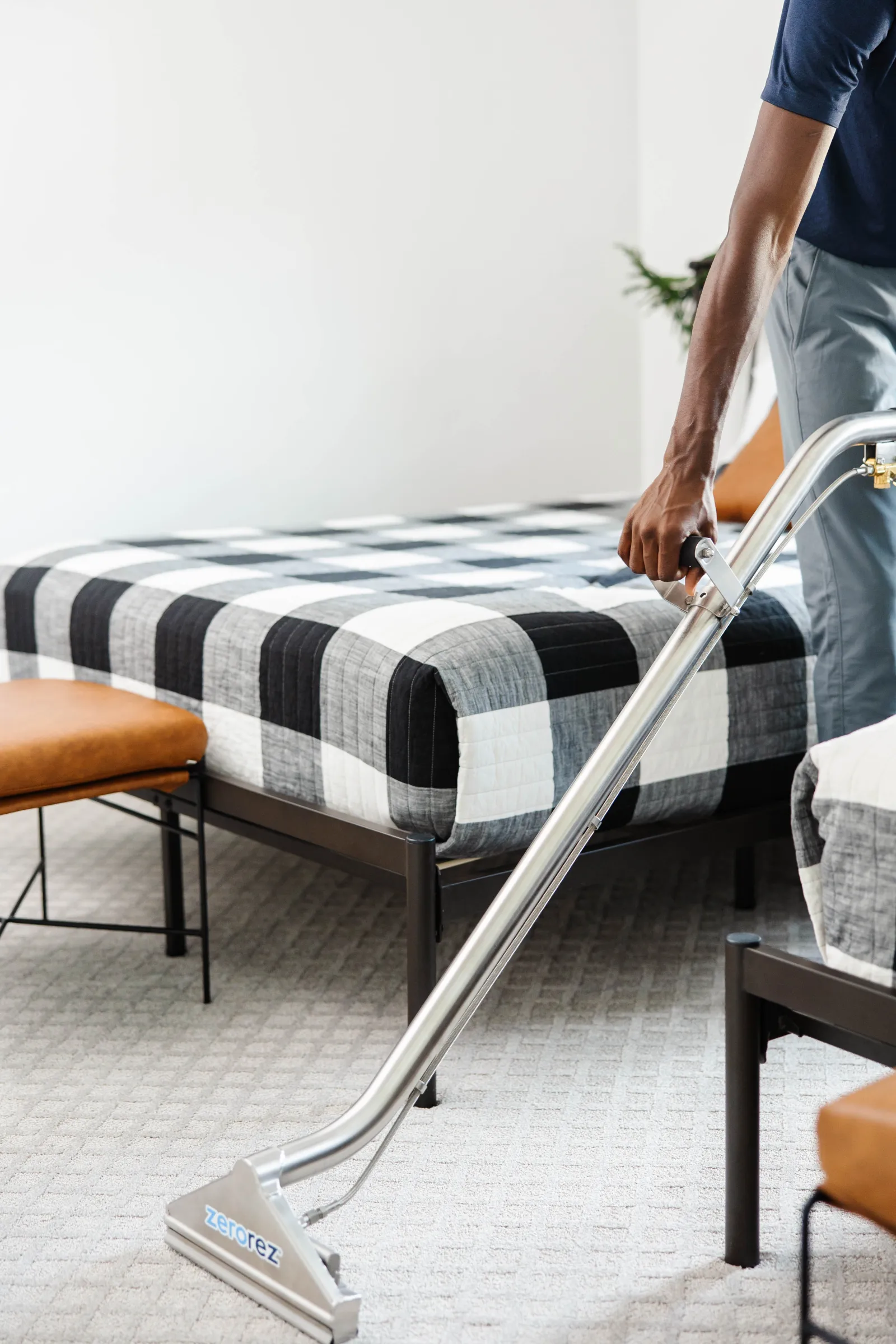 carpet cleaning wand on light carpet