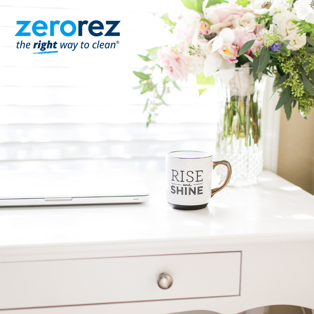 desk in home office with flowers